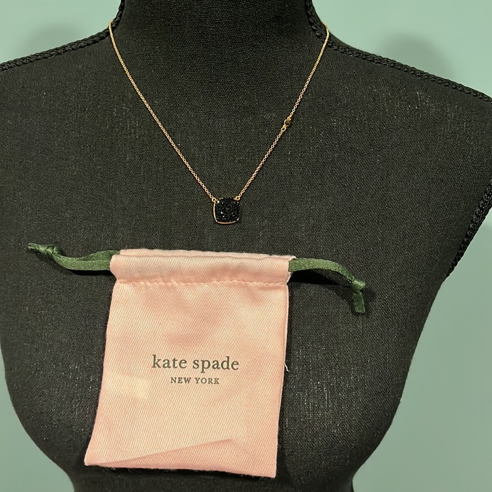 Kate Spade jet black paved pendant. Gold tone,